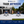 Advertisement for Skate Anytime synthetic ice training system showing indoor and outdoor use.