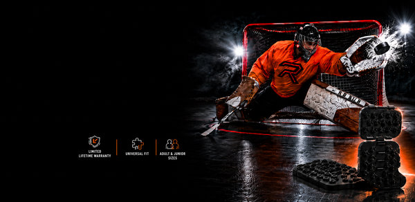 Hockey player in orange jersey with helmet and stick on ice rink